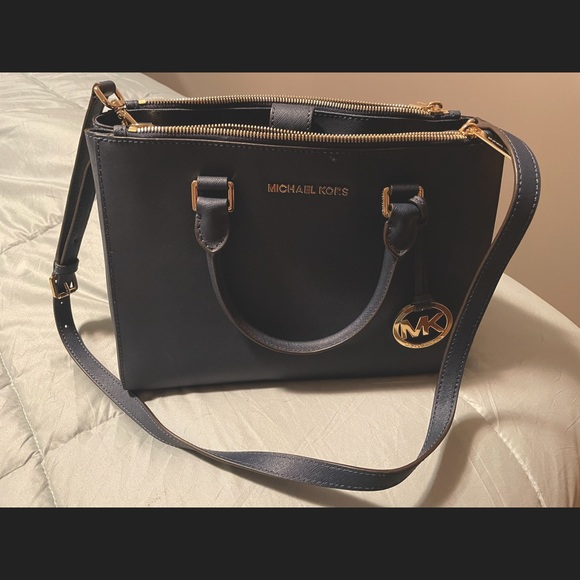 Michael Kors Handbags - Michael Kors navy blue satchel with gold details